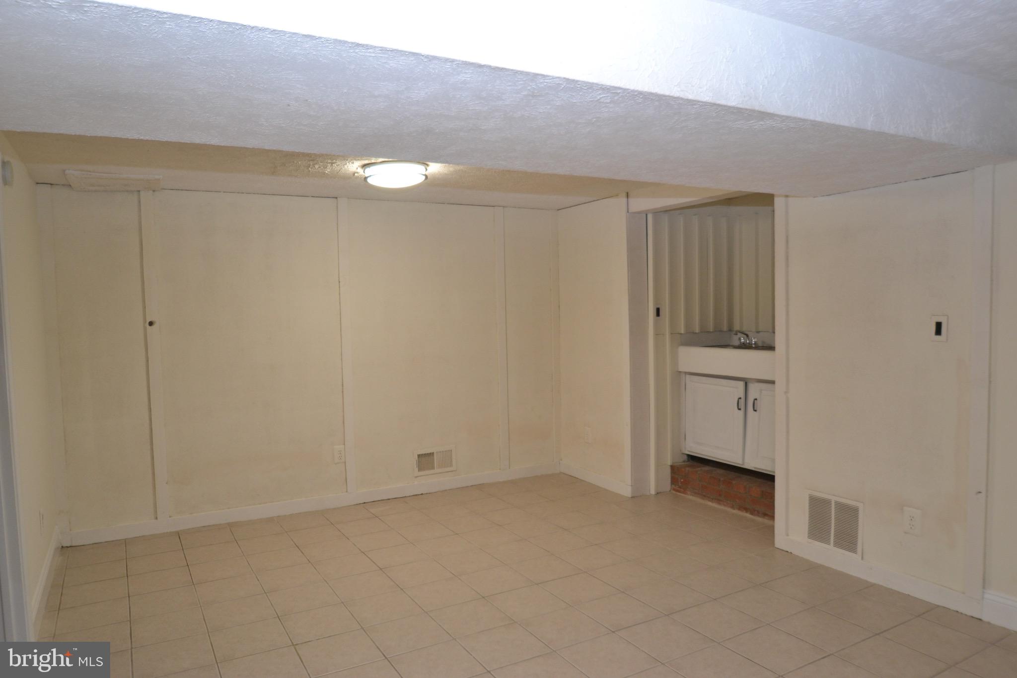 1600 Chain Bridge Road McLean, VA 22101 - Photo 30 of 35 Basement Rec Room with bar
