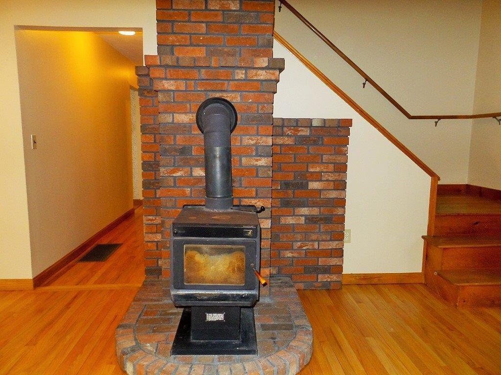 488 West Road Belgrade, ME 04917 - Photo 12 of 42 Heart with woodstove