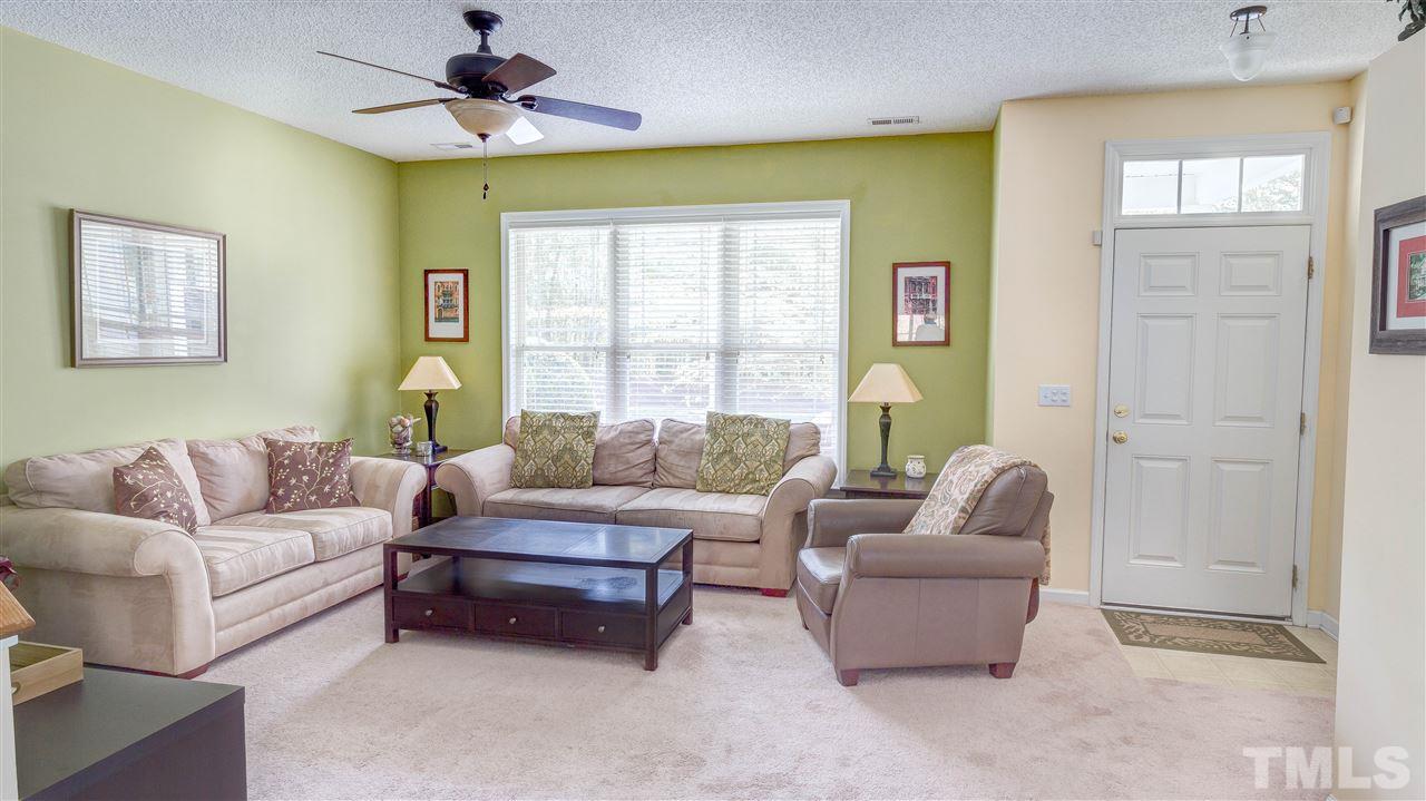 1011 Dual Parks Road Apex, NC 27502 - Photo 2 of 21 Nice sized living room open to dining room and kitchen.