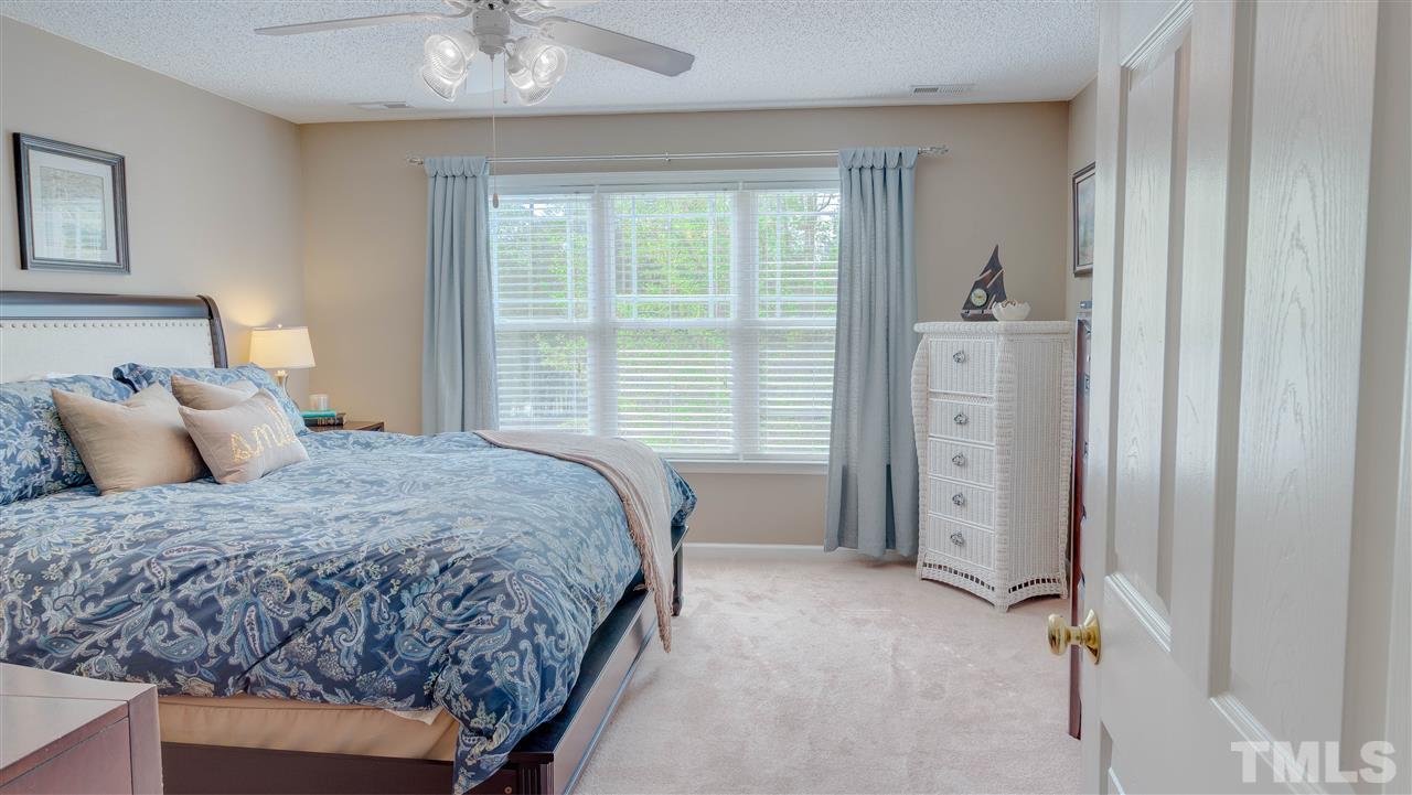 1011 Dual Parks Road Apex, NC 27502 - Photo 11 of 21 Large master bedroom with walk-in closet. Master bath has big garden tub with shower.