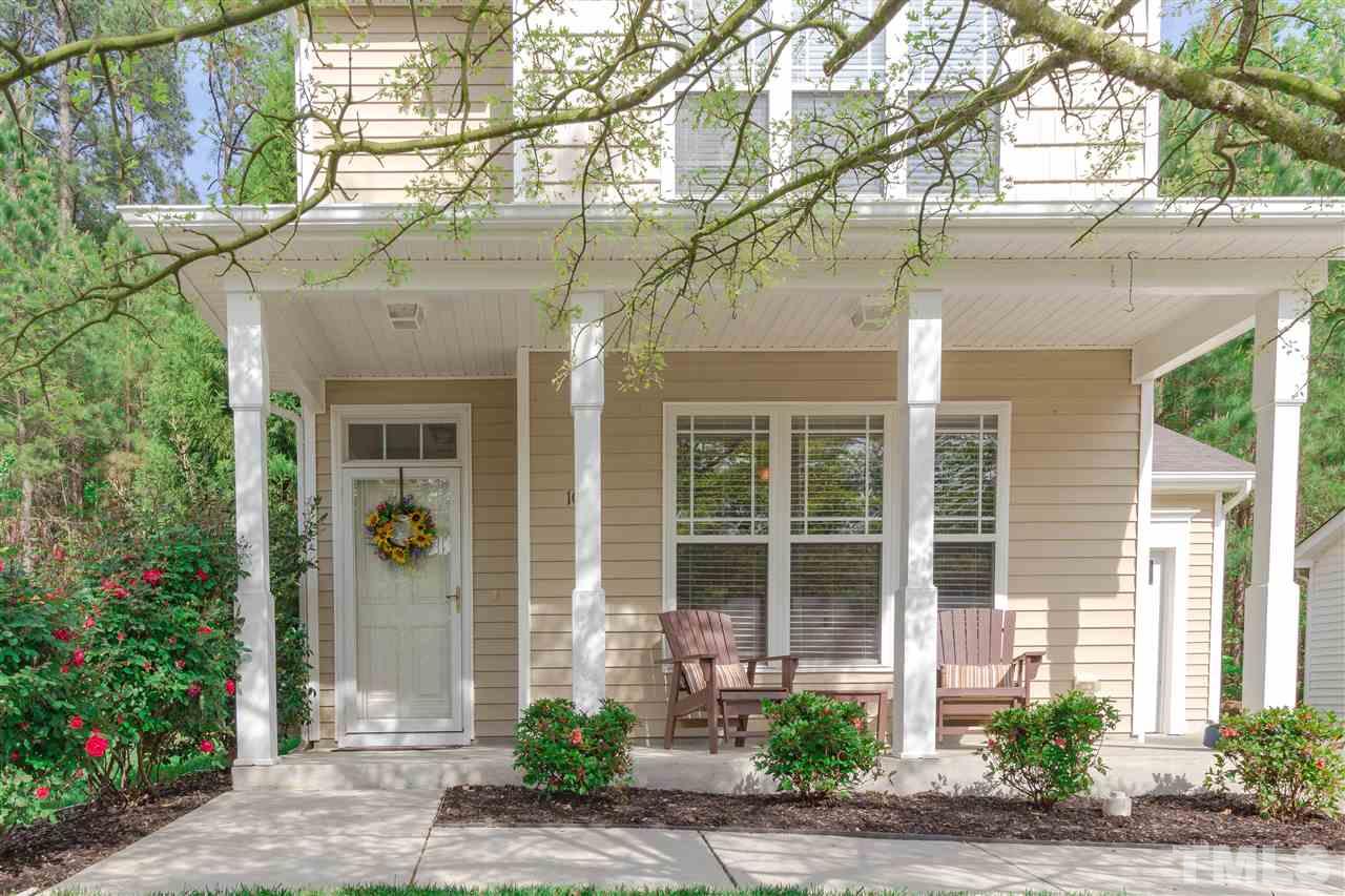 1011 Dual Parks Road Apex, NC 27502 - Photo 18 of 21 Enjoy the front porch shaded by a beautiful big tree