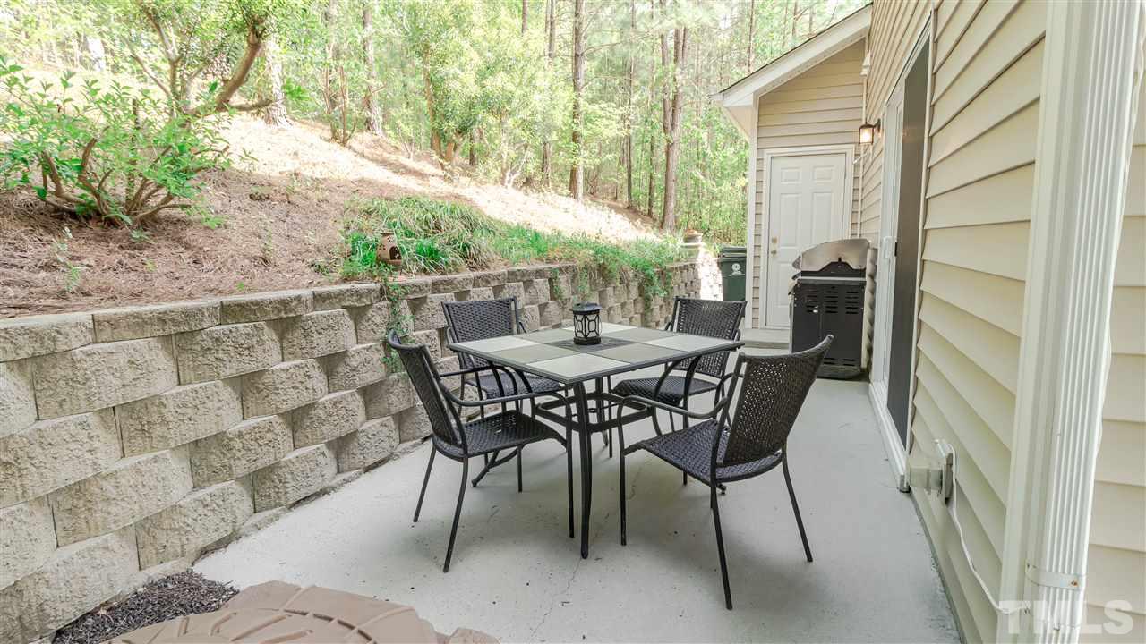 1011 Dual Parks Road Apex, NC 27502 - Photo 6 of 21 Patio with lights! Also, there is an outside shower and service door into the garage from patio.