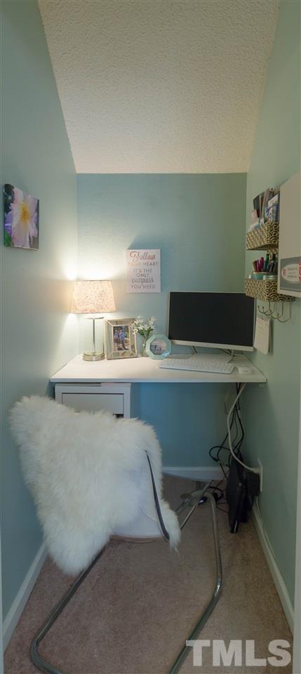 1011 Dual Parks Road Apex, NC 27502 - Photo 7 of 21 Seller made an at-home work office in the large area under the stairs!!