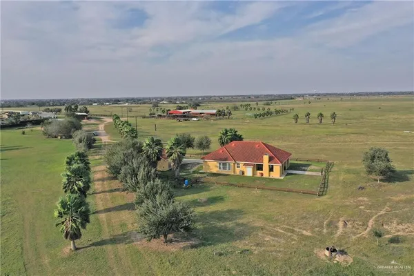 a view of a lake with a big yard
