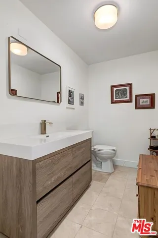 a bathroom with a sink and a toilet