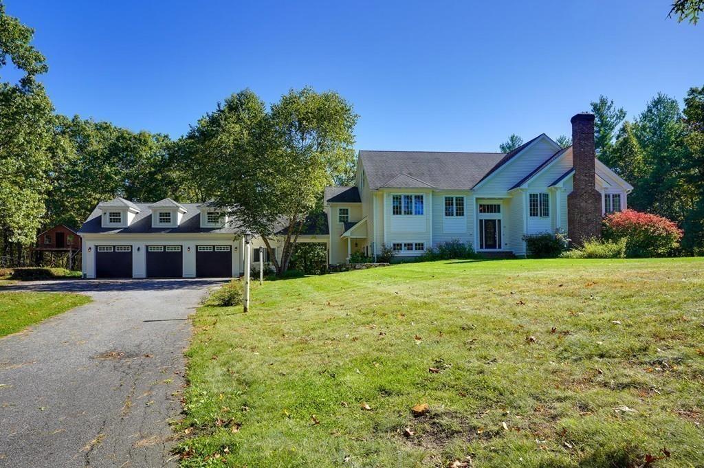 32 Frye Road Bolton, MA 01740 - Photo 33 of 35 a front view of house with yard and green space