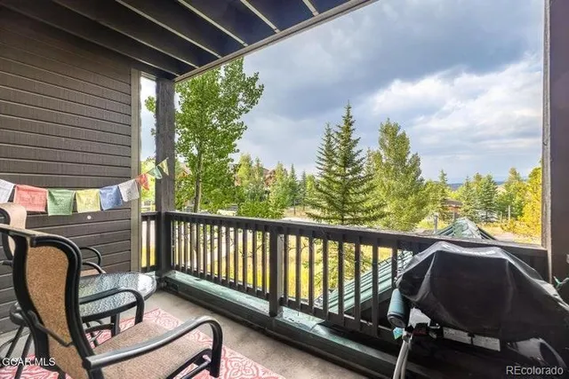 a view of balcony with furniture
