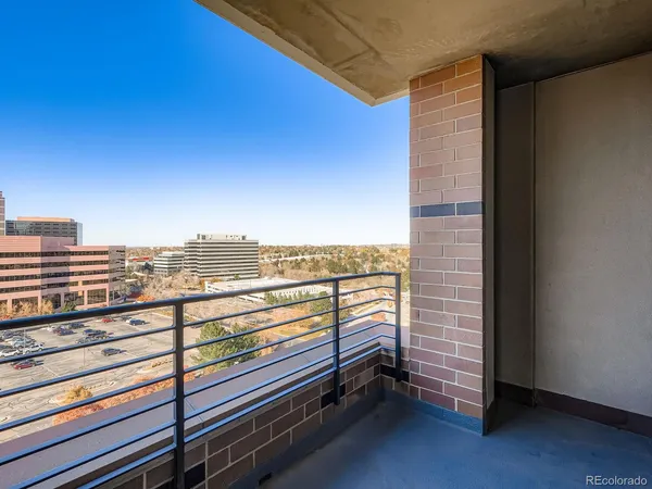 a view of a balcony with city view