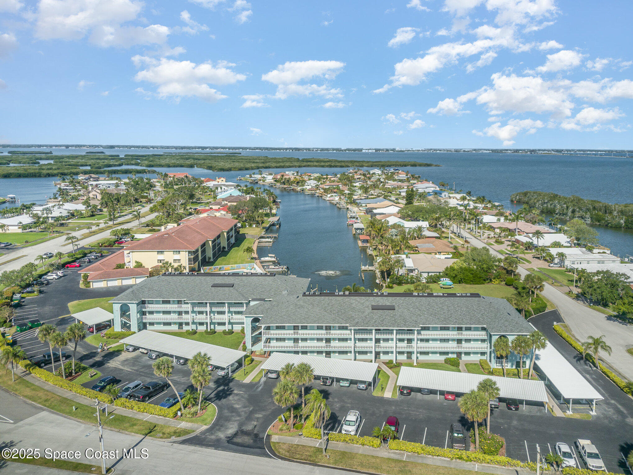 2001 South Banana River Boulevard, Unit 319 Cocoa Beach, FL 32931 - Photo 1 of 45 a view of a city with an ocean view