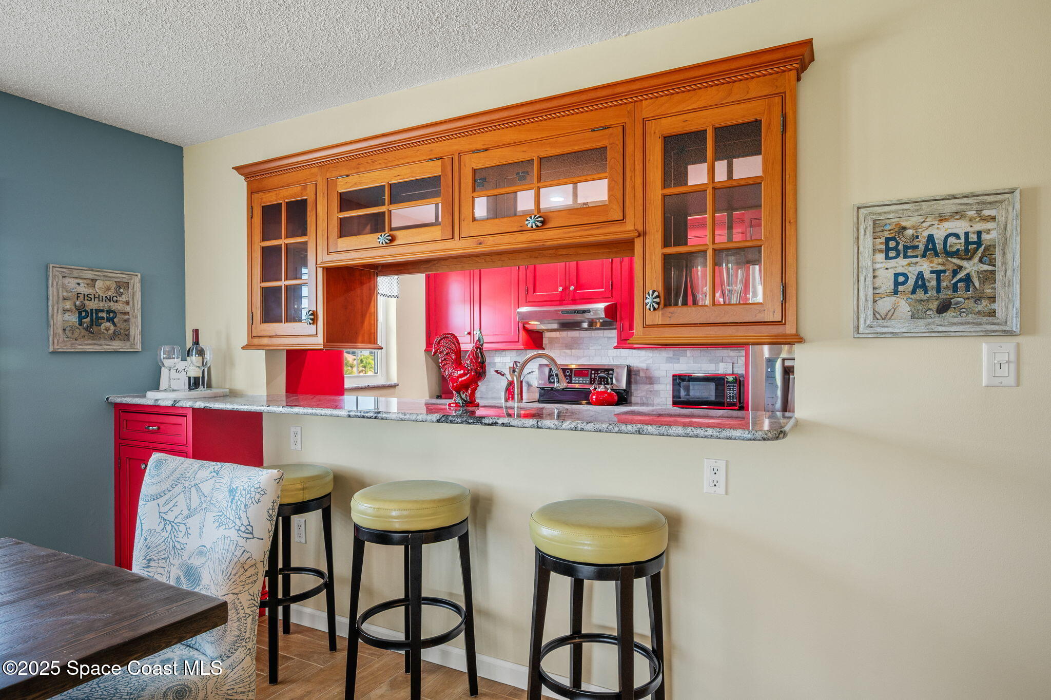 2001 South Banana River Boulevard, Unit 319 Cocoa Beach, FL 32931 - Photo 12 of 45 a dining room with furniture and window