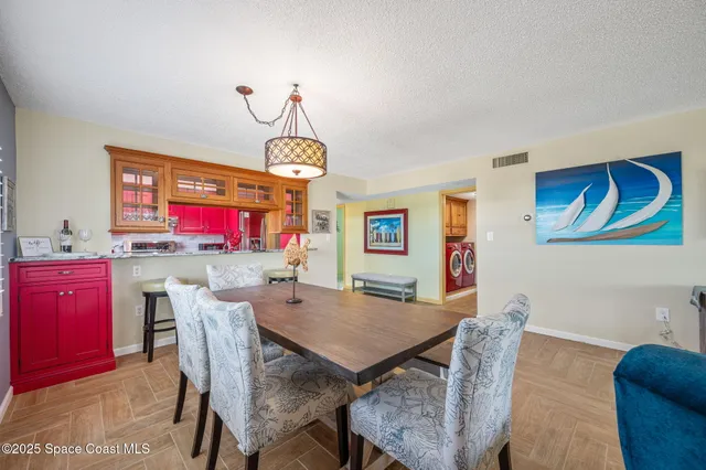 a view of a dining room with furniture