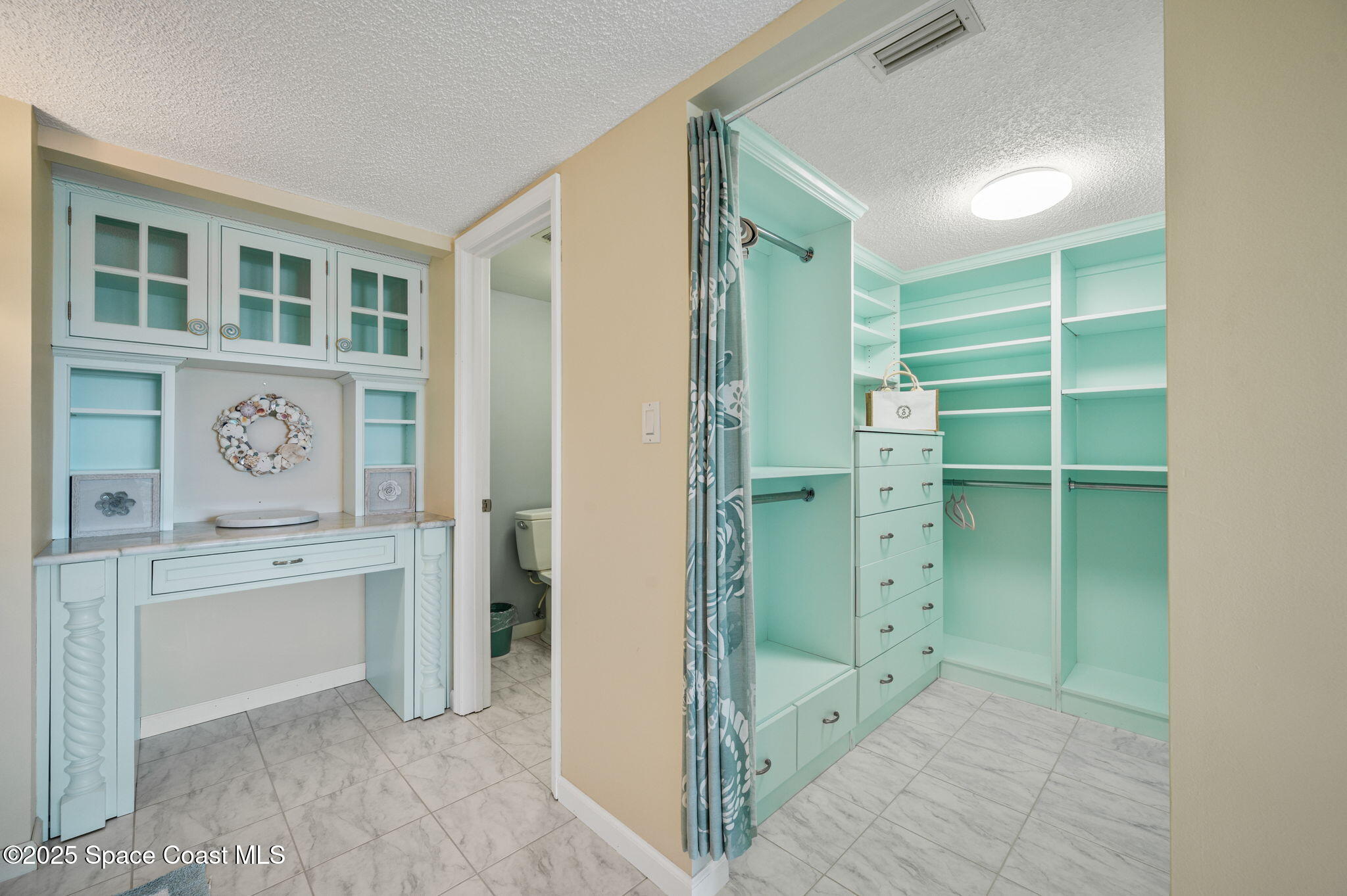 2001 South Banana River Boulevard, Unit 319 Cocoa Beach, FL 32931 - Photo 26 of 45 a view of kitchen and utility room