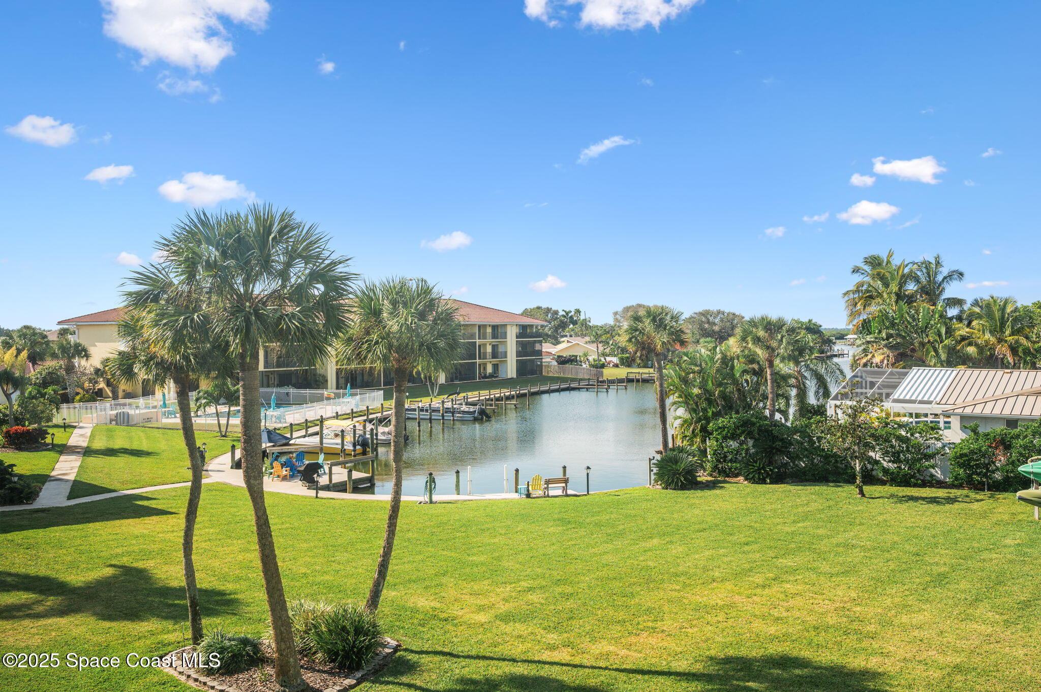 2001 South Banana River Boulevard, Unit 319 Cocoa Beach, FL 32931 - Photo 36 of 45 a view of a lake with a big yard