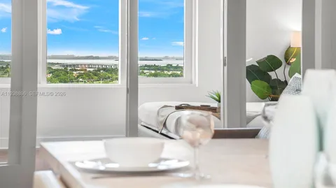 a vase of flowers sitting on a table