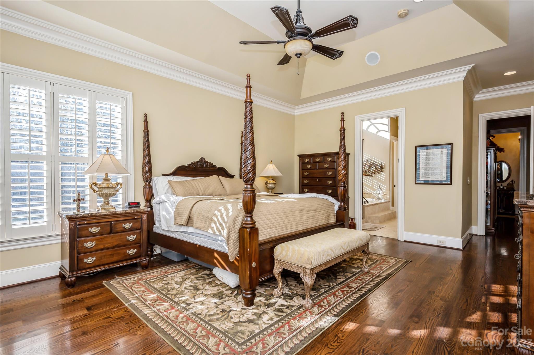 5720 Unionville-Brief Road Monroe, NC 28110 - Photo 20 of 48 a bedroom with a bed and wooden floor