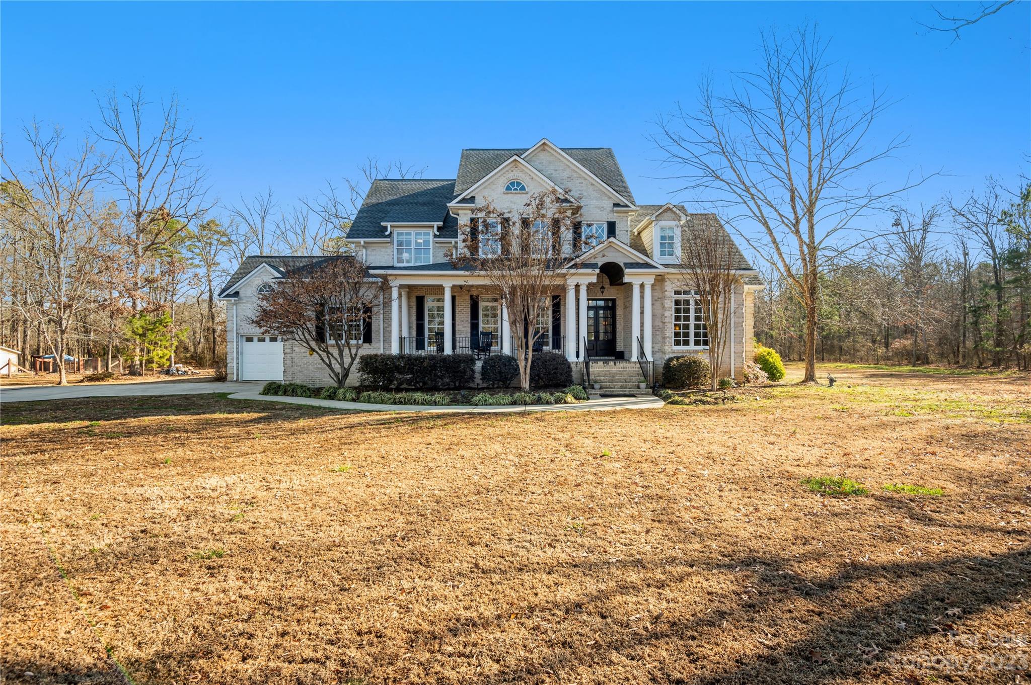 5720 Unionville-Brief Road Monroe, NC 28110 - Photo 33 of 48 a front view of a house with a yard