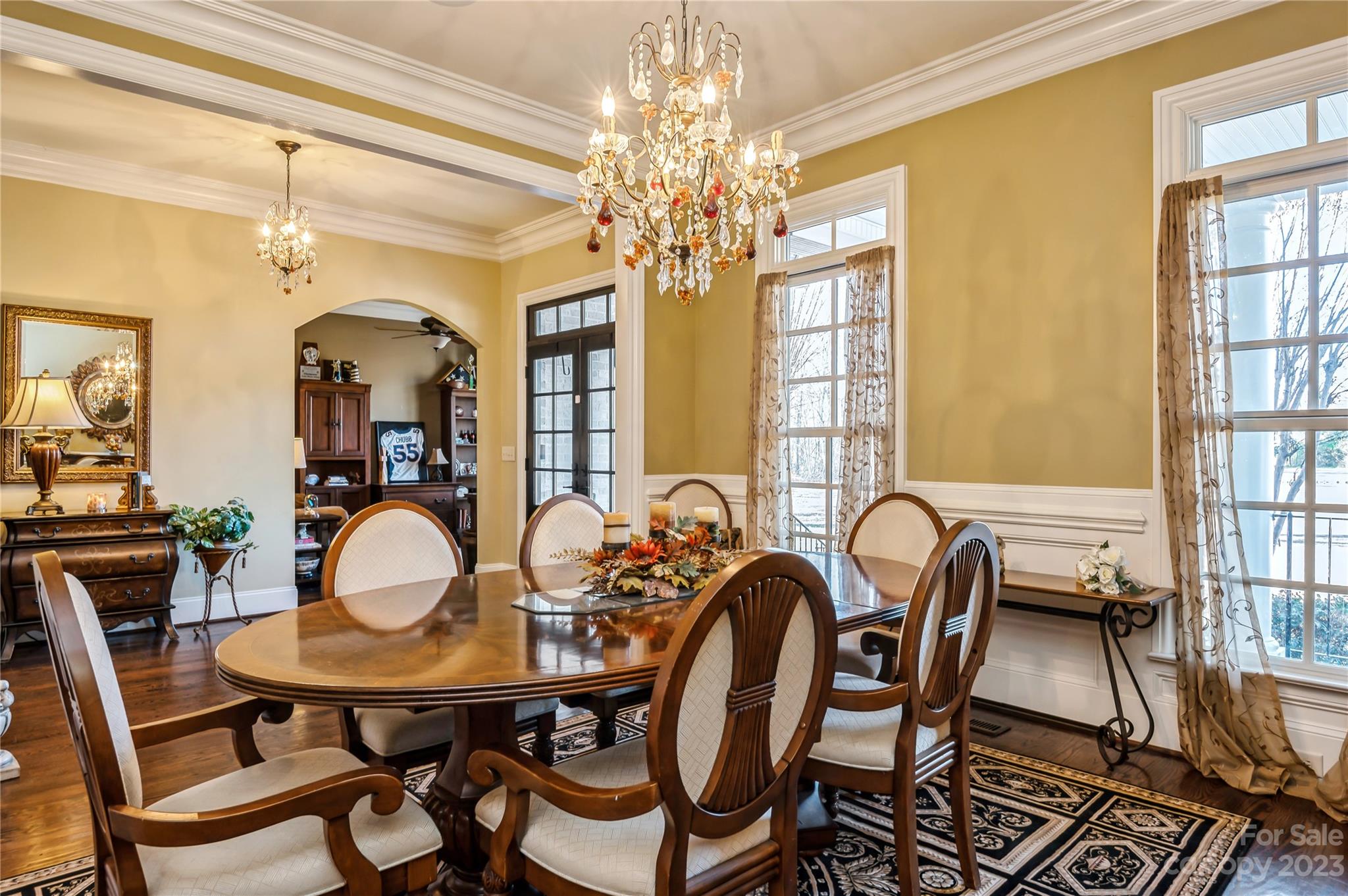 5720 Unionville-Brief Road Monroe, NC 28110 - Photo 7 of 48 a dining room with furniture a chandelier and window