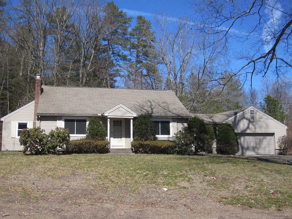 51 Scantic Road Hampden, MA 01036 - Photo 1 of 11 a front view of a house with a yard and tree