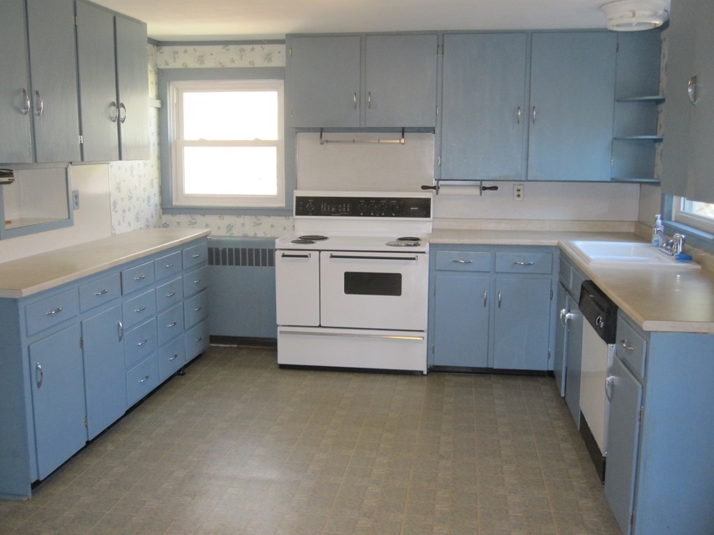 51 Scantic Road Hampden, MA 01036 - Photo 5 of 11 a kitchen with cabinets appliances a sink and a window