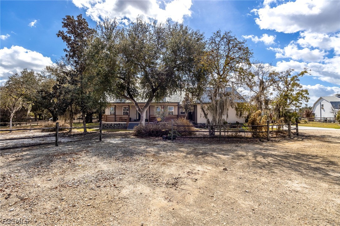 22800 North River Road Alva, FL 33920 - Photo 2 of 50 a view of a park with large trees