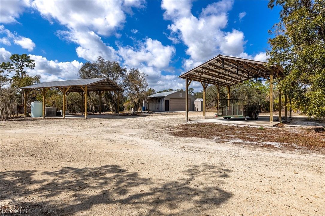 22800 North River Road Alva, FL 33920 - Photo 34 of 50 a view of a house with a snow in the yard