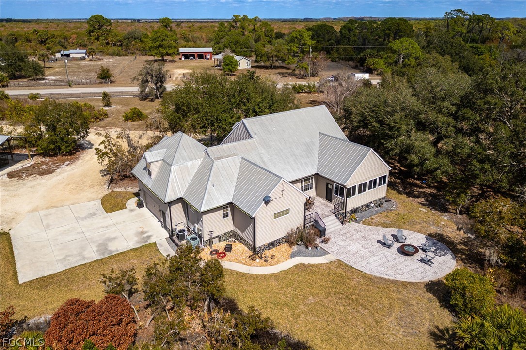 22800 North River Road Alva, FL 33920 - Photo 44 of 50 an aerial view of a house with outdoor space