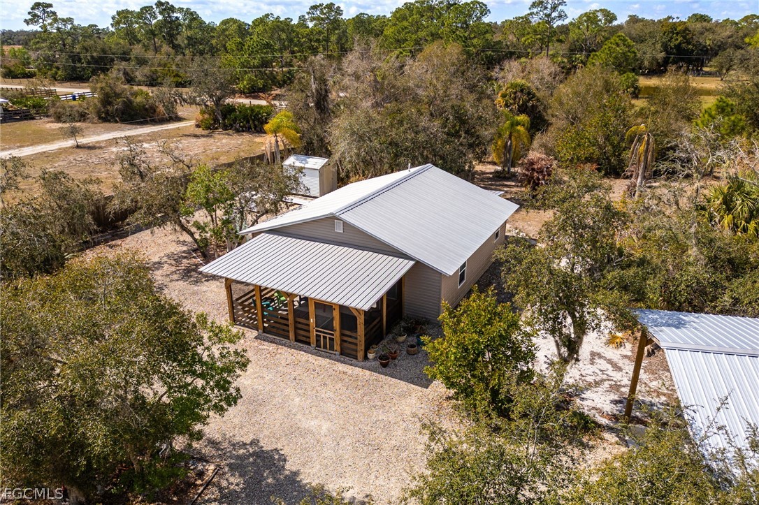 22800 North River Road Alva, FL 33920 - Photo 45 of 50 an aerial view of a house with a yard