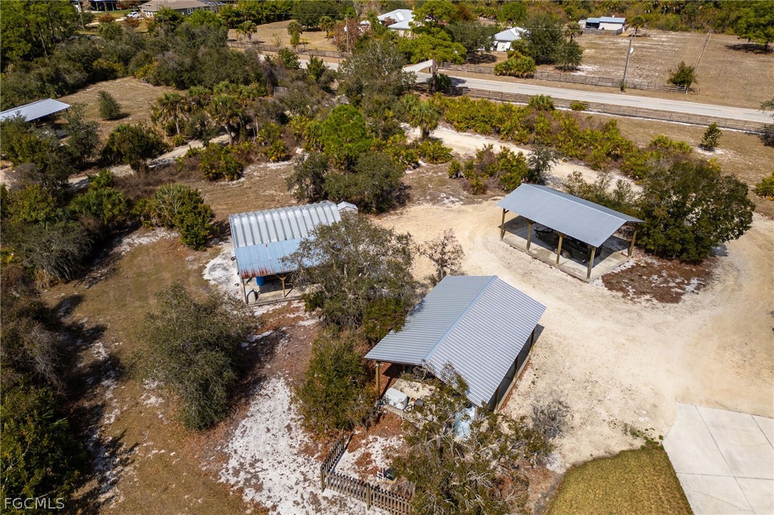22800 North River Road Alva, FL 33920 - Photo 46 of 50 an aerial view of a house with a lake view