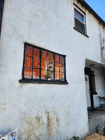 a front view of a house with staircase