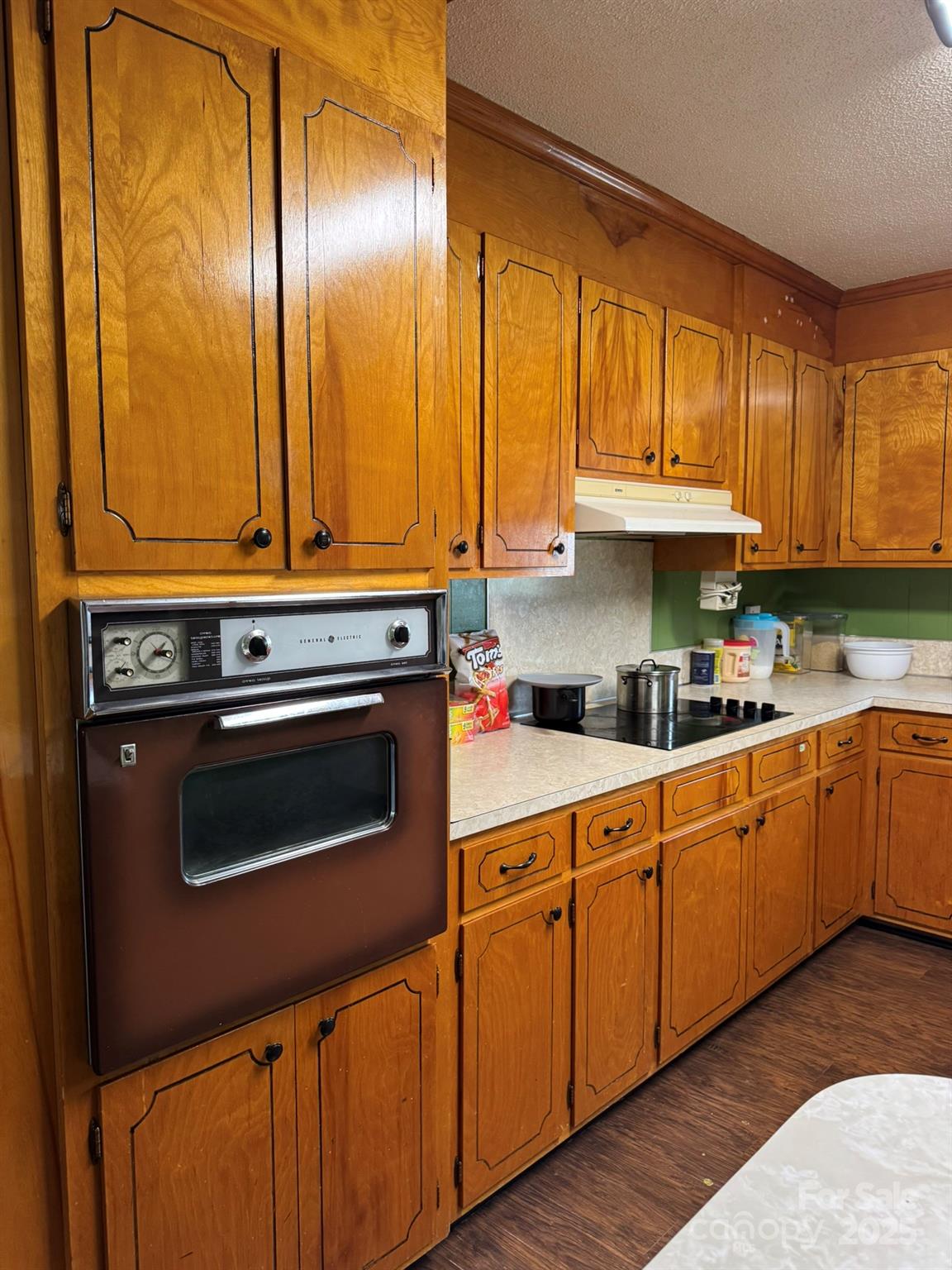 1575 Simplicity Road Concord, NC 28025 - Photo 13 of 23 a kitchen with stainless steel appliances granite countertop a stove a sink and a microwave