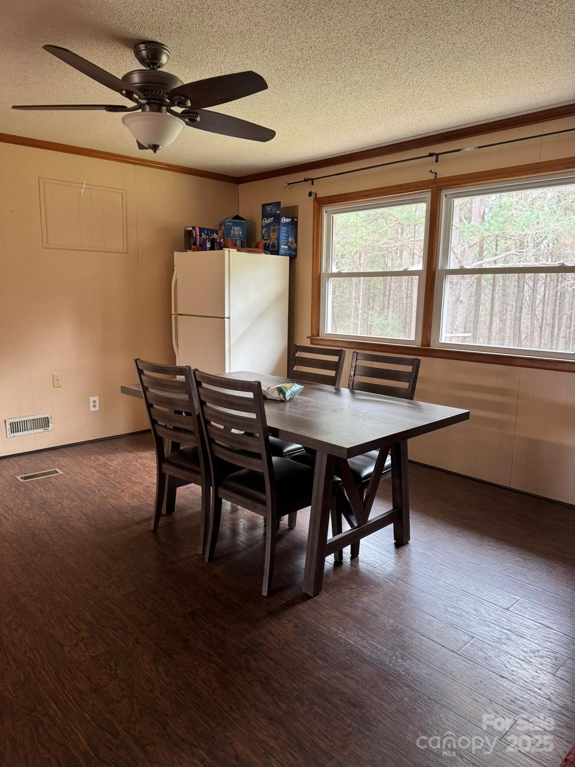 1575 Simplicity Road Concord, NC 28025 - Photo 10 of 23 a view of a dining room with furniture window and wooden floor