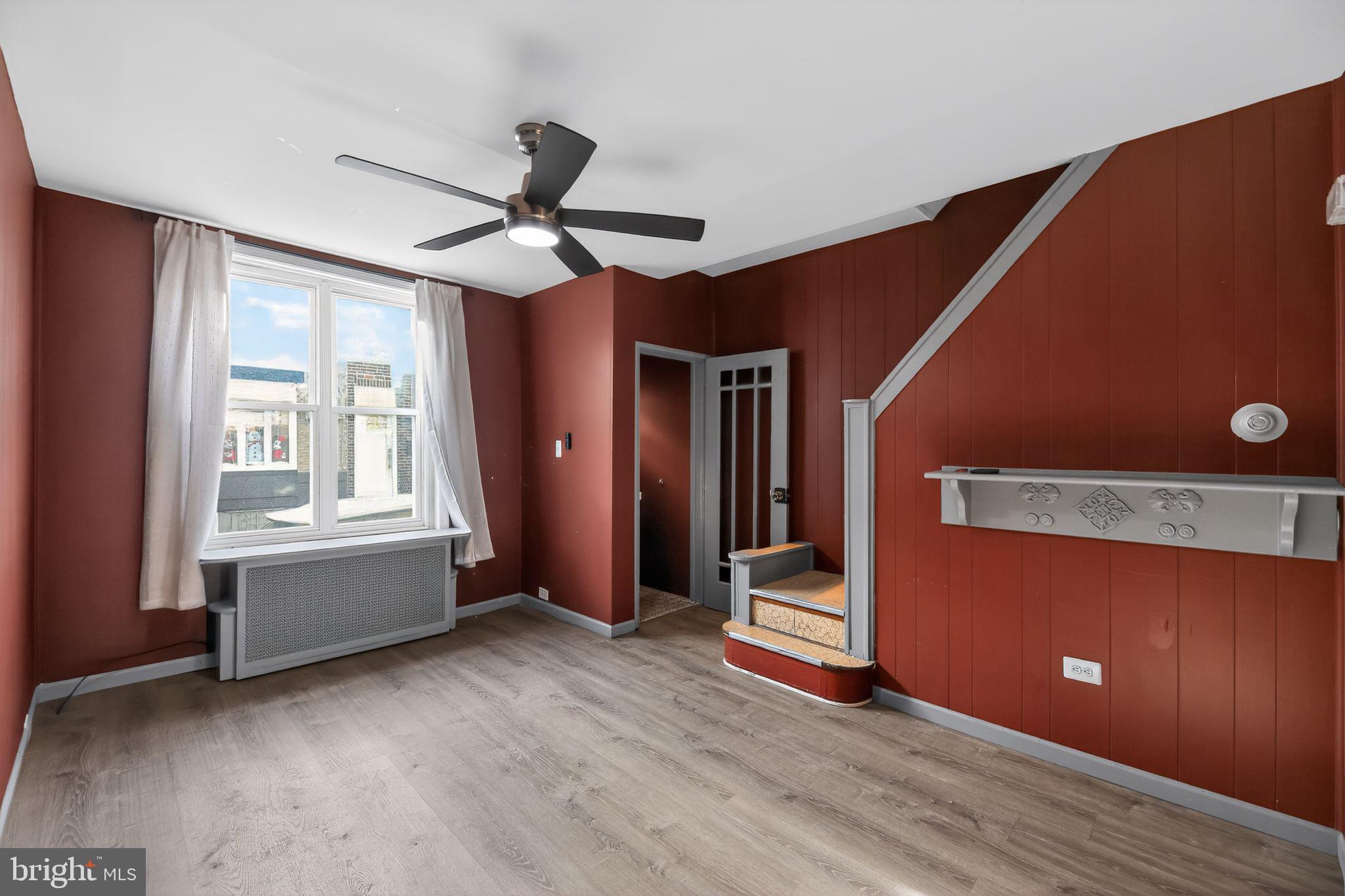 315 Fitzgerald Street Philadelphia, PA 19148 - Photo 13 of 15 a view of an empty room with a window