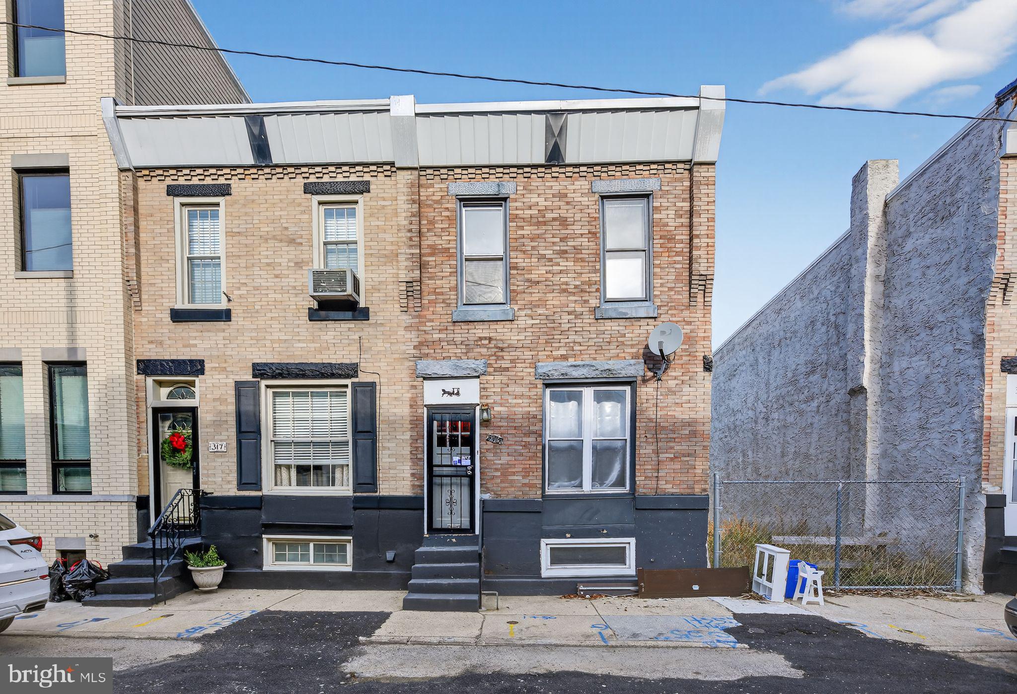 315 Fitzgerald Street Philadelphia, PA 19148 - Photo 15 of 15 a front view of a building with large windows