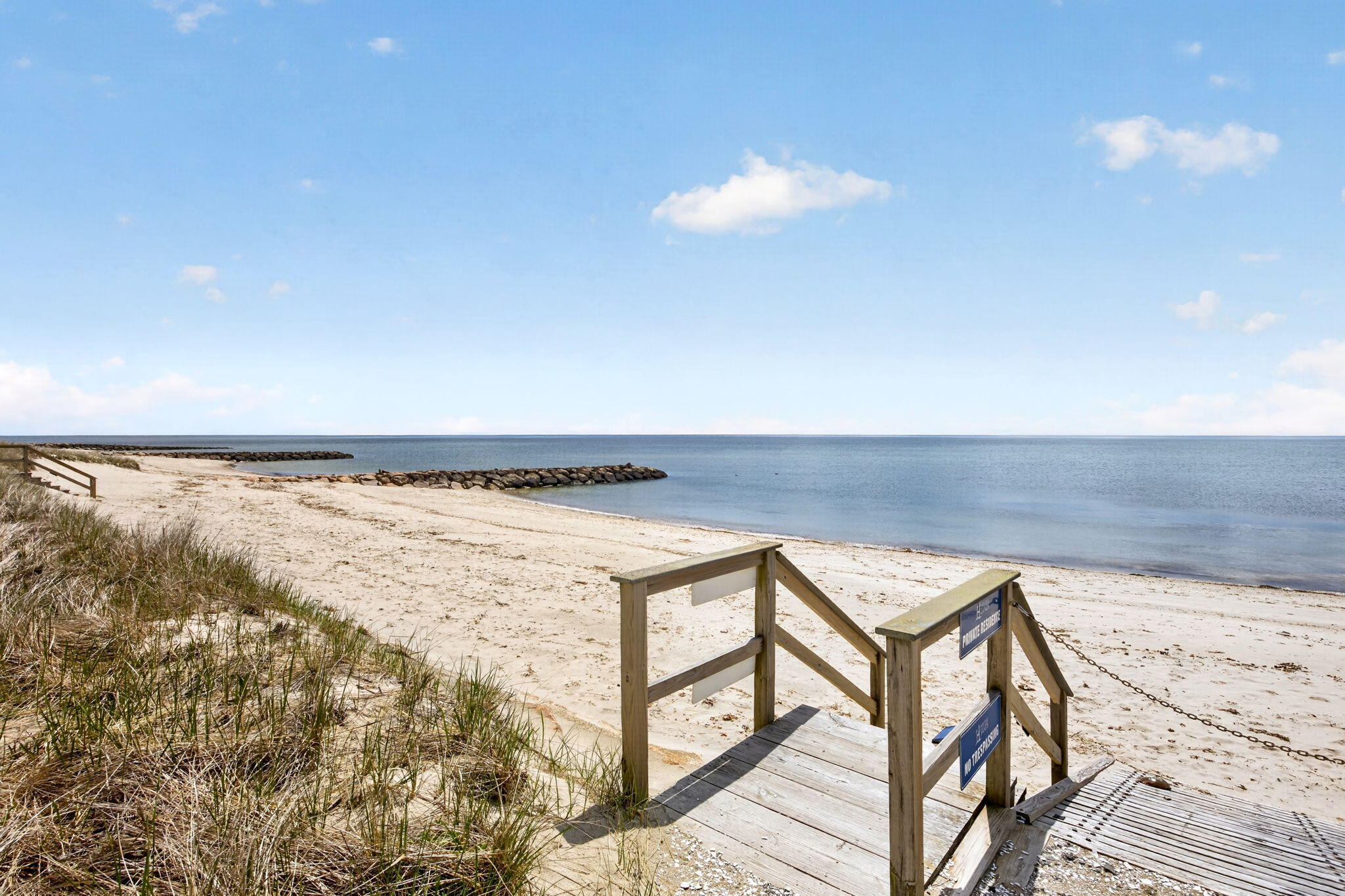 61 Old Wharf Road, Unit 62 Dennis Port, MA 02639 - Photo 11 of 45 a view of swimming pool from a balcony