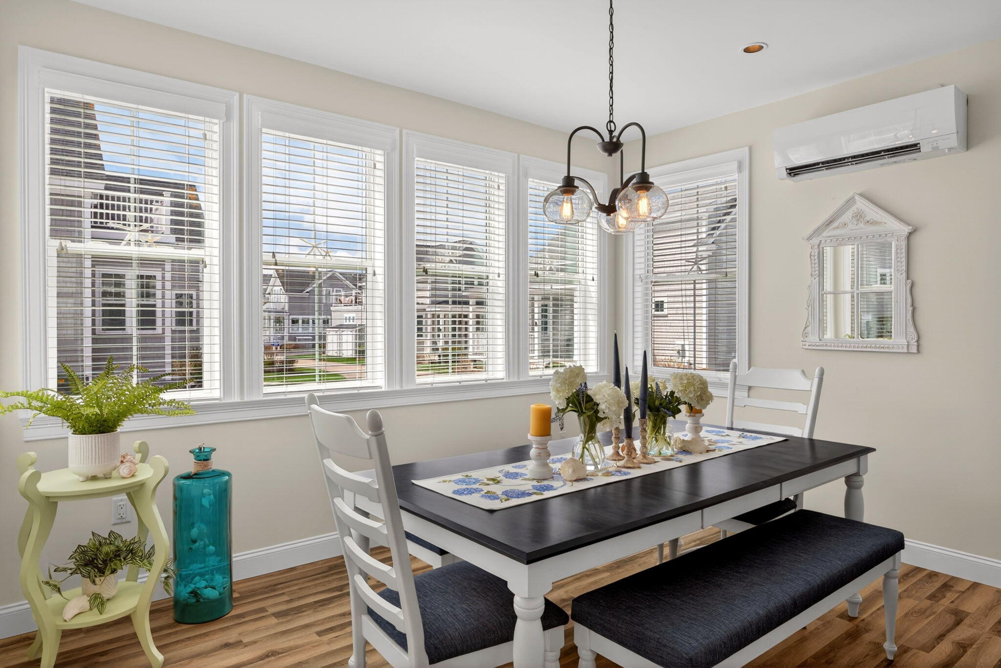 61 Old Wharf Road, Unit 62 Dennis Port, MA 02639 - Photo 18 of 45 a view of a dining room with furniture window and outside view