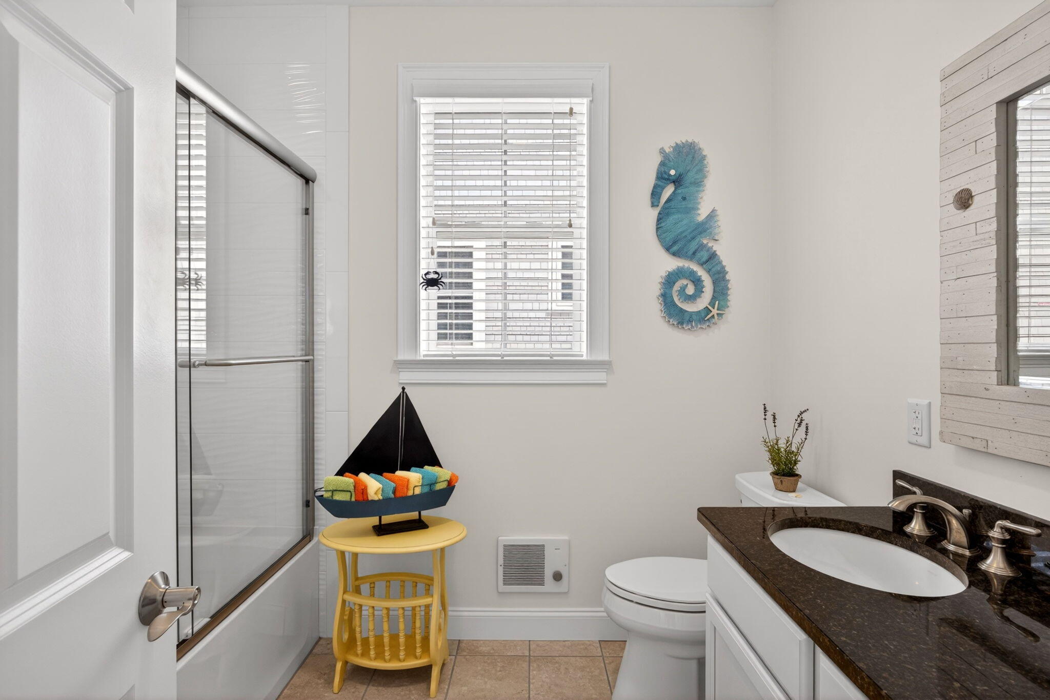 61 Old Wharf Road, Unit 62 Dennis Port, MA 02639 - Photo 26 of 45 a bathroom with a granite countertop sink and a mirror