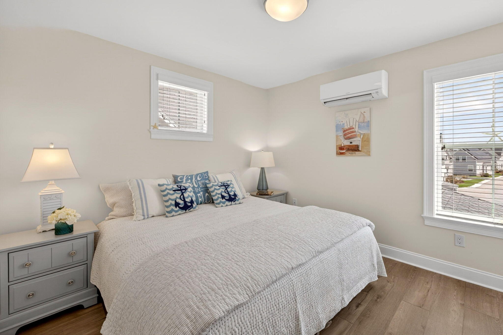 61 Old Wharf Road, Unit 62 Dennis Port, MA 02639 - Photo 28 of 45 a bedroom with a bed and a window