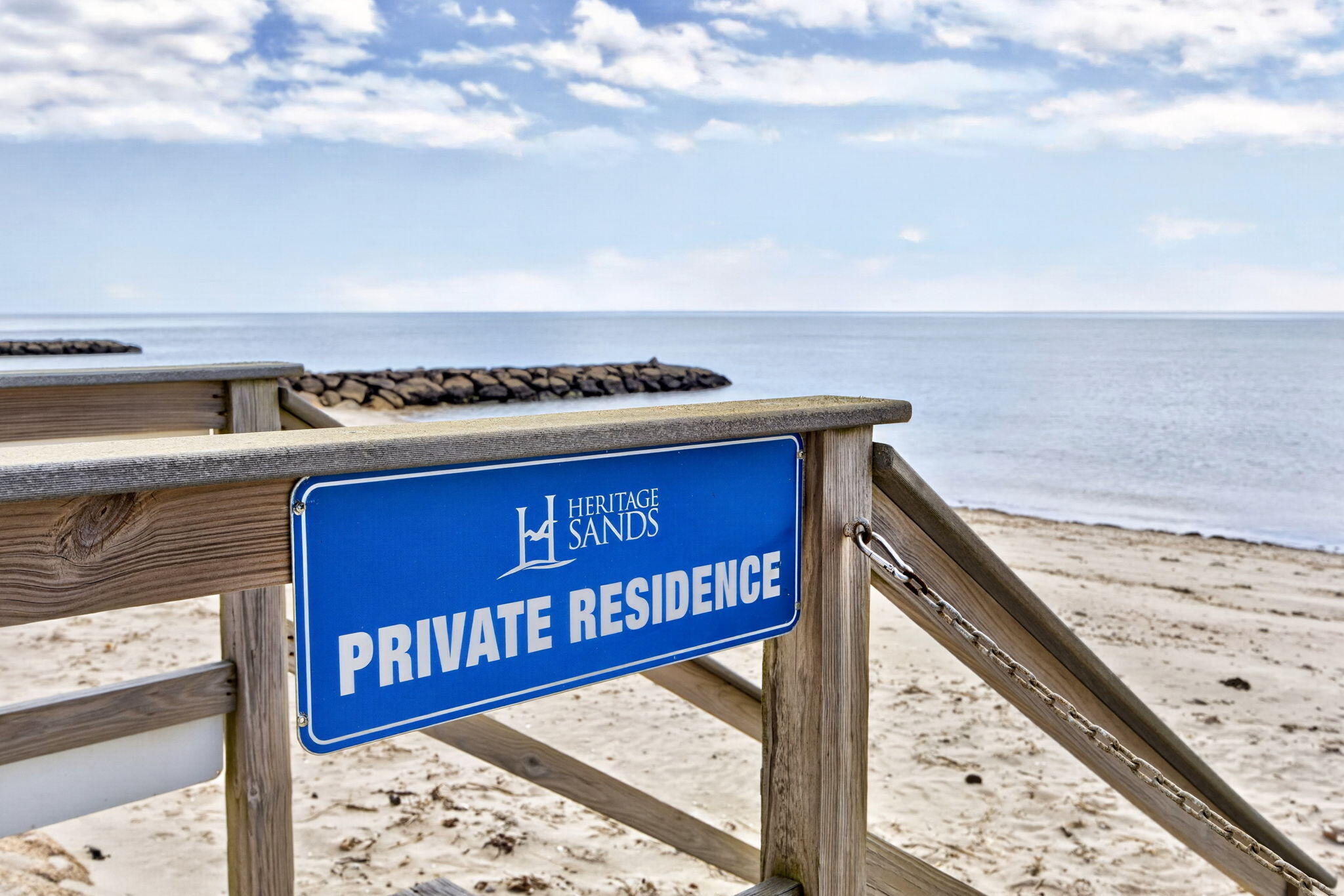 61 Old Wharf Road, Unit 62 Dennis Port, MA 02639 - Photo 34 of 45 a view of a sign board with an ocean