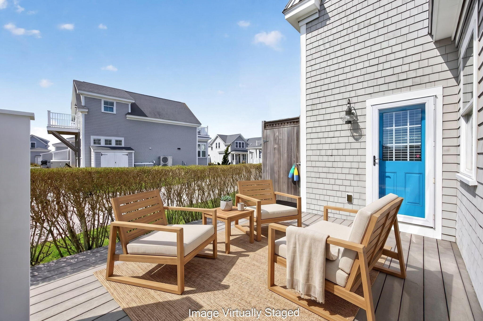 61 Old Wharf Road, Unit 62 Dennis Port, MA 02639 - Photo 39 of 45 a balcony with table and chairs