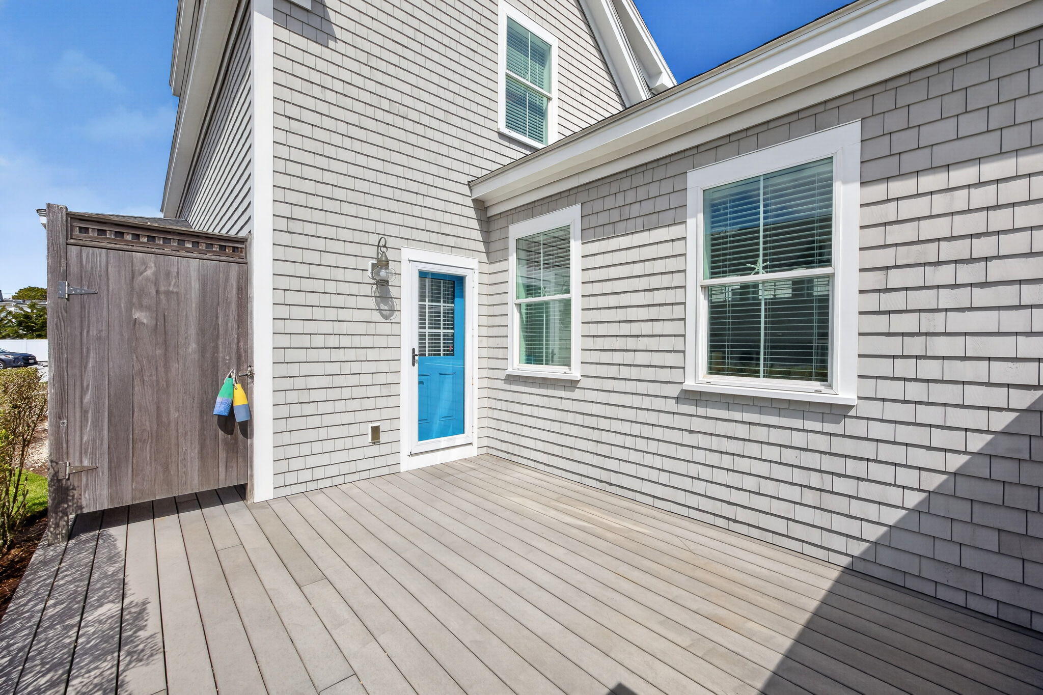 61 Old Wharf Road, Unit 62 Dennis Port, MA 02639 - Photo 40 of 45 a view of a house with wooden deck