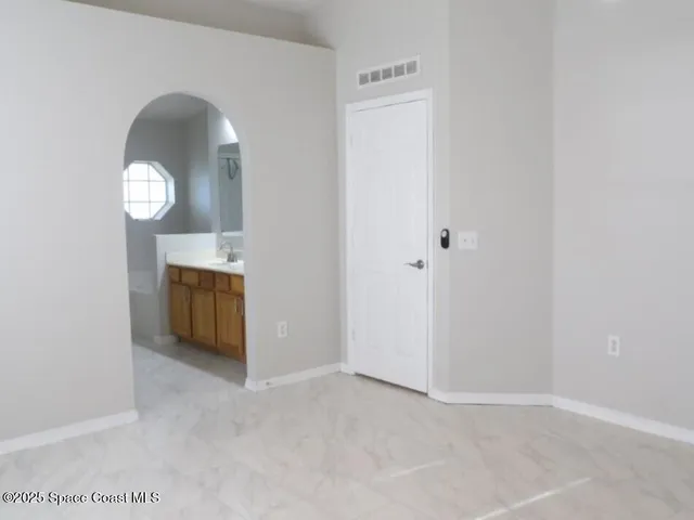 an empty room with a window