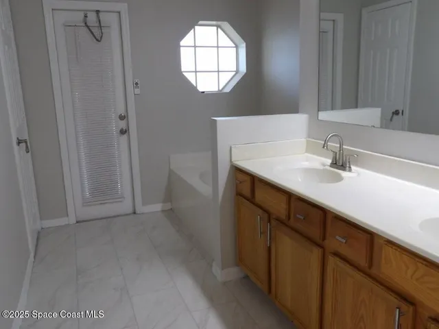 a bathroom with a shower and toilet