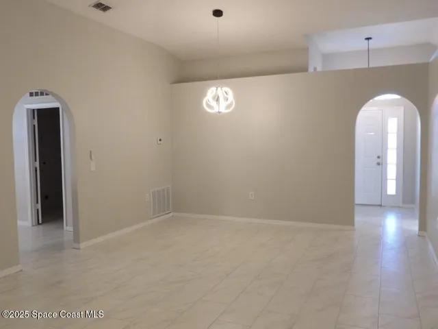 a view of a livingroom with wooden floor
