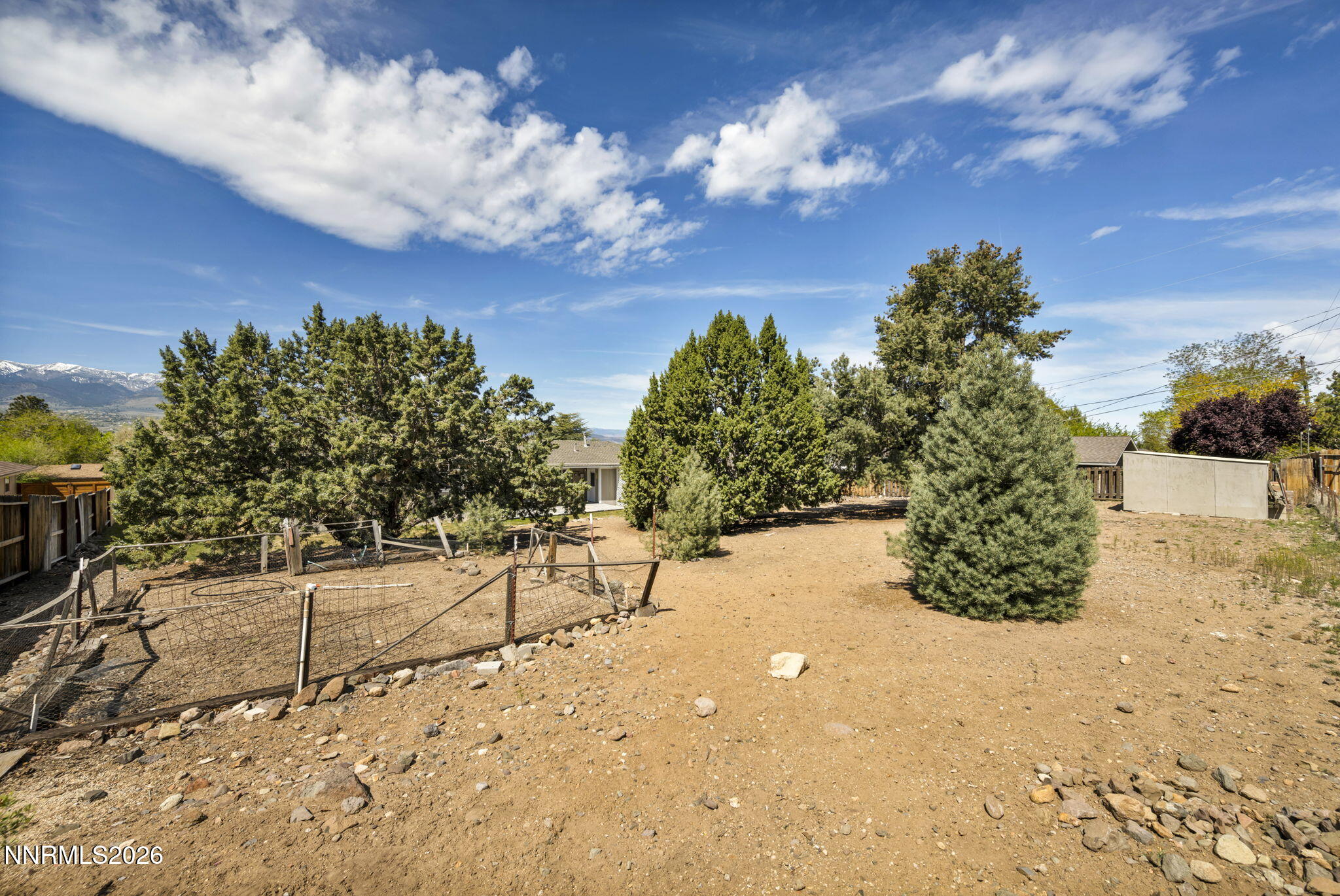 14190 Rim Rock Drive Reno, NV 89521 - Photo 58 of 68 a view of a yard with snow on the road