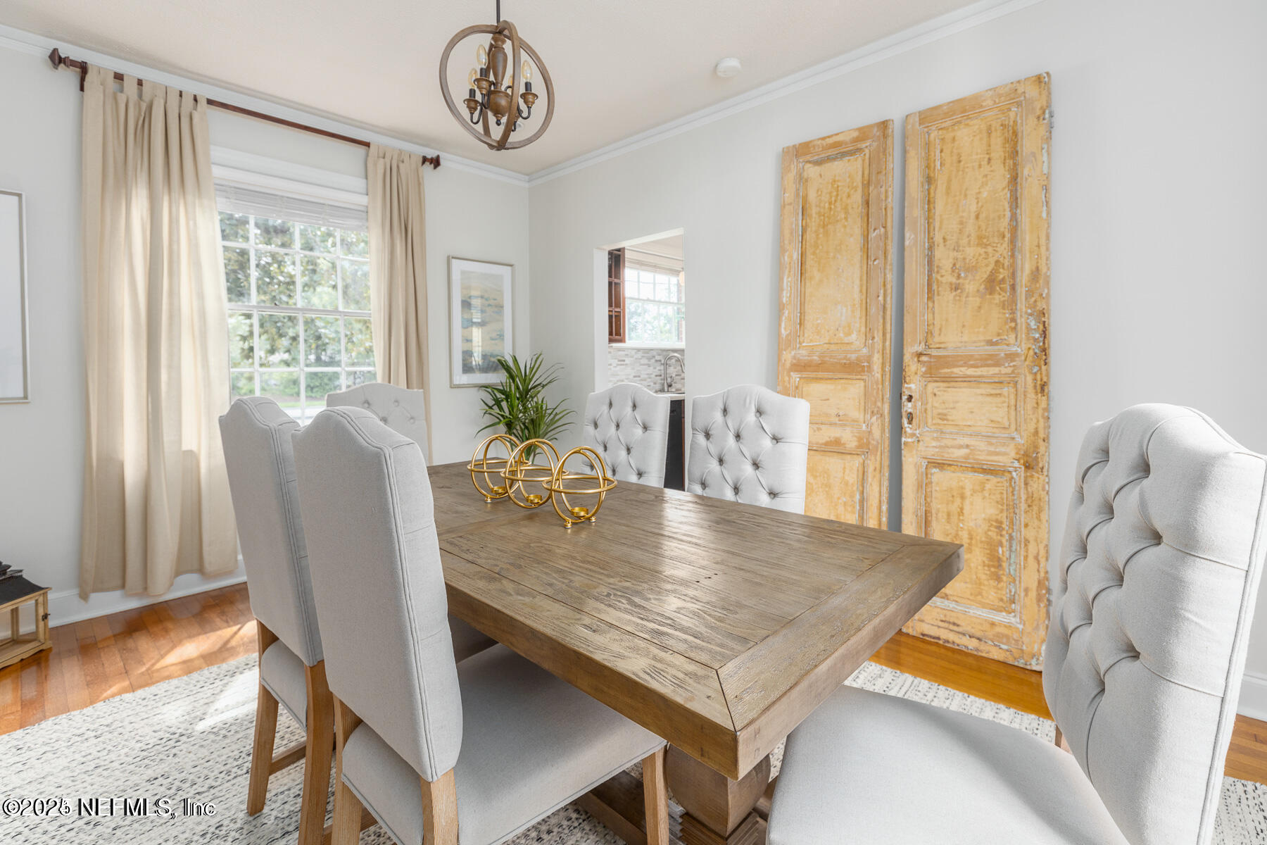2545 Hendricks Avenue Jacksonville, FL 32207 - Photo 17 of 45 a view of a dining room with furniture and wooden floor