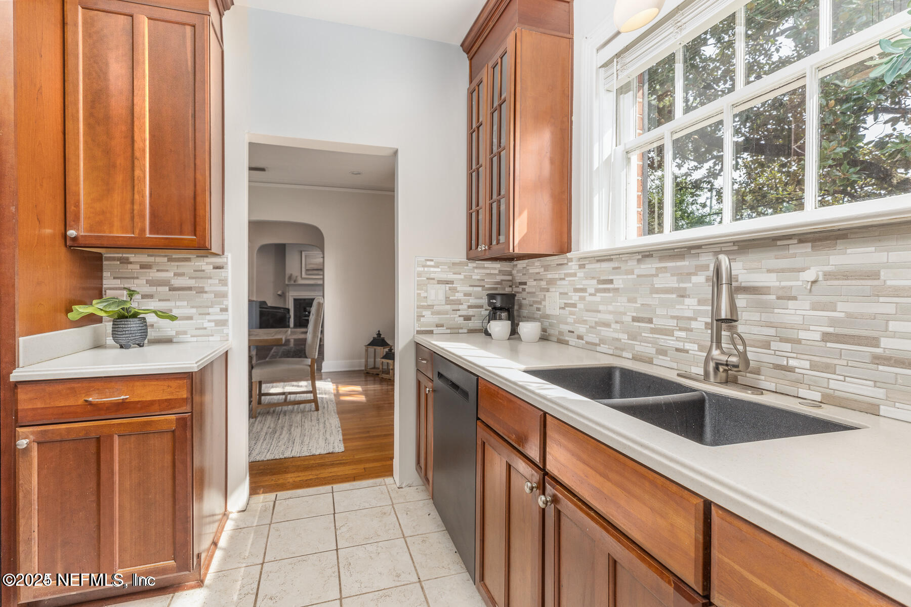 2545 Hendricks Avenue Jacksonville, FL 32207 - Photo 19 of 45 a kitchen with a sink and a refrigerator