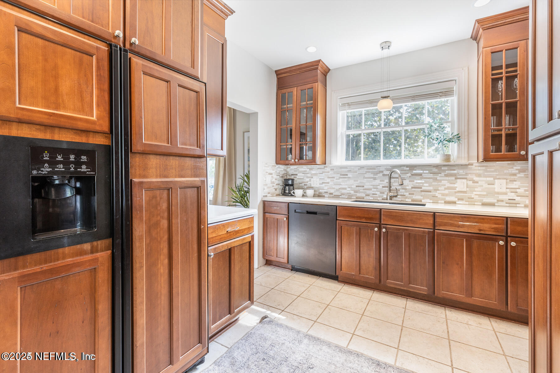 2545 Hendricks Avenue Jacksonville, FL 32207 - Photo 21 of 45 a kitchen with stainless steel appliances granite countertop a refrigerator and a sink