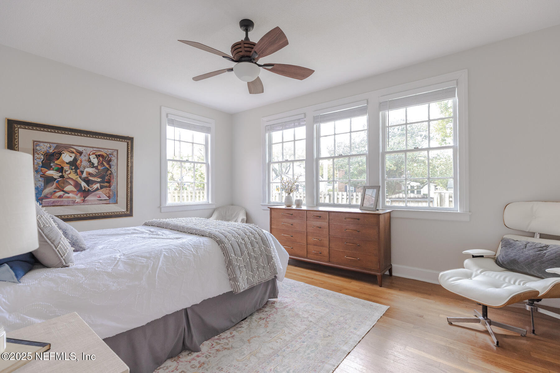 2545 Hendricks Avenue Jacksonville, FL 32207 - Photo 28 of 45 a spacious bedroom with a large bed and a window