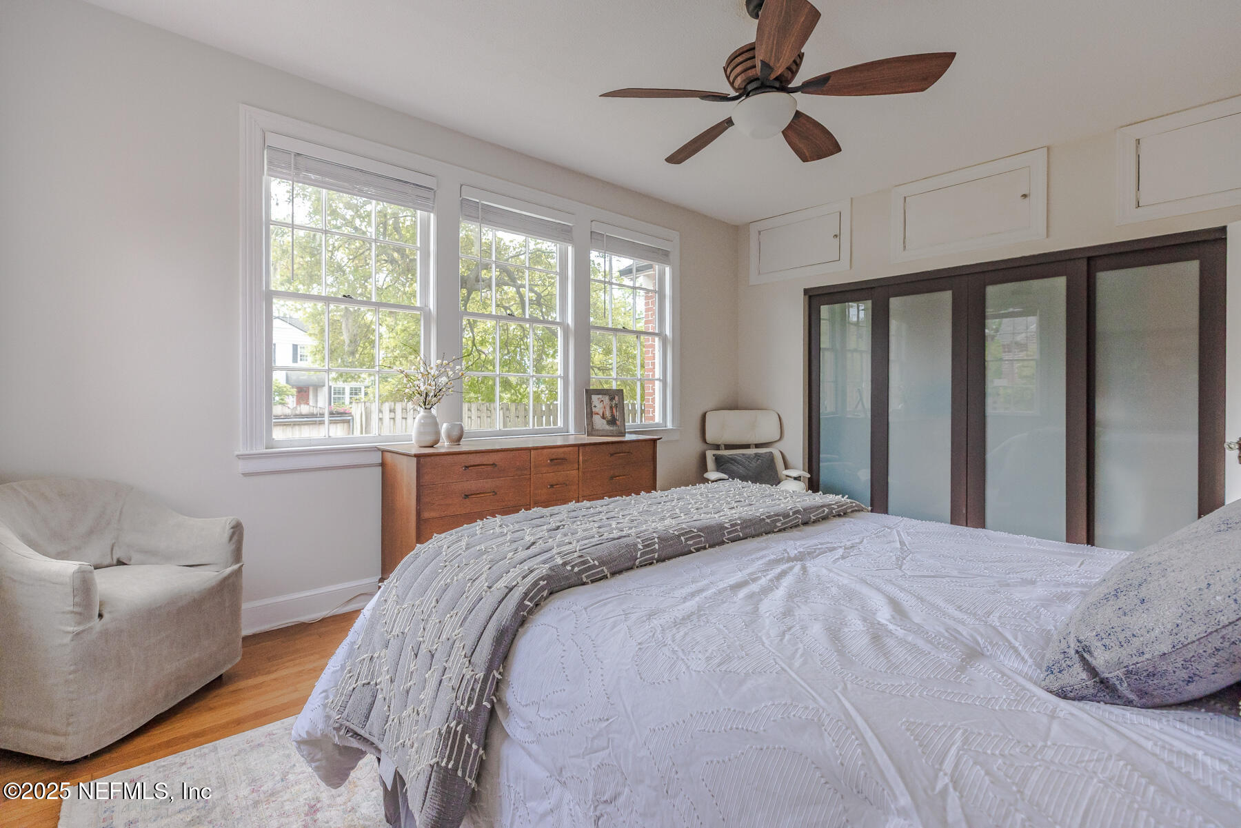 2545 Hendricks Avenue Jacksonville, FL 32207 - Photo 29 of 45 a bedroom with a bed ceiling fan and a window