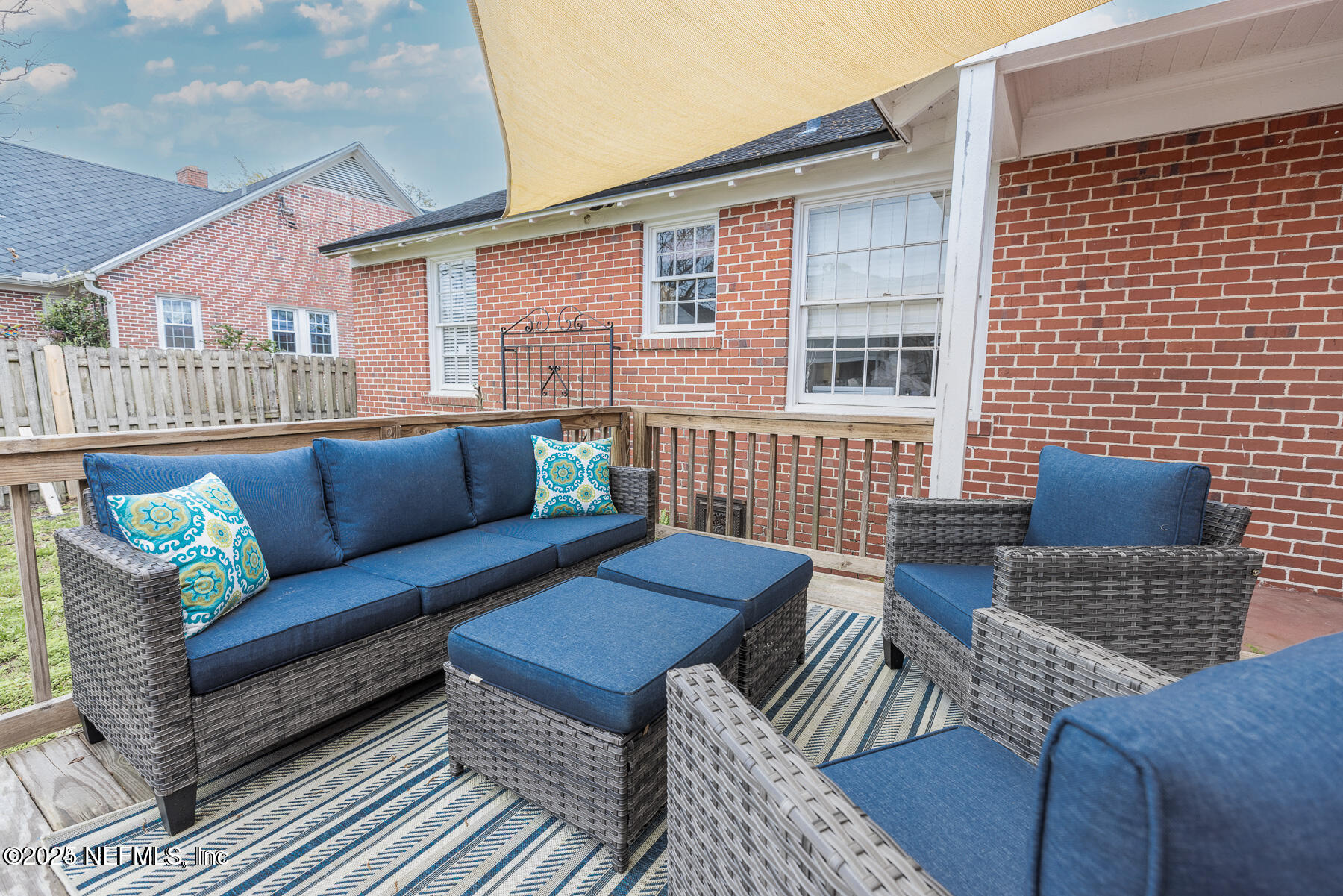 2545 Hendricks Avenue Jacksonville, FL 32207 - Photo 40 of 45 a view of a patio with couches chairs and wooden floor